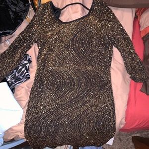 Black and gold glittery dress